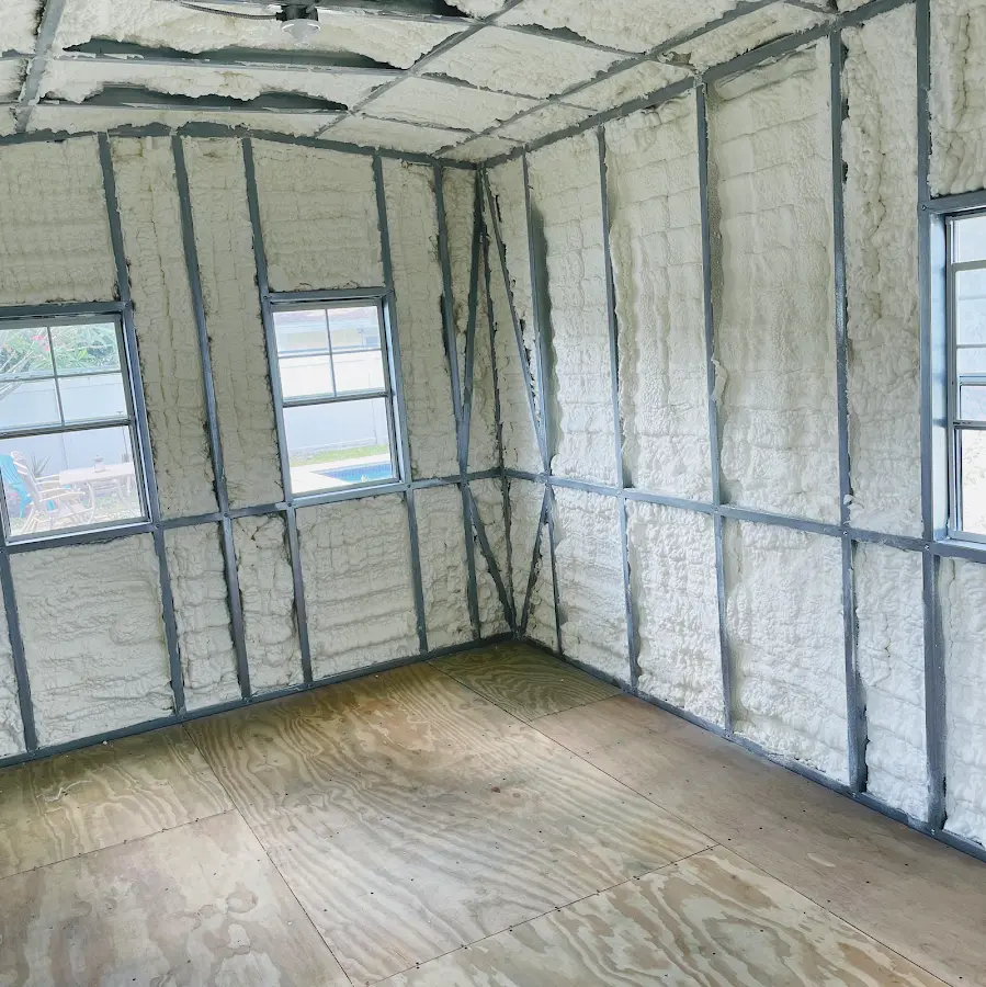 Closed-cell spray foam insulation applied to wall cavities in a residential project in Bolingbrook
